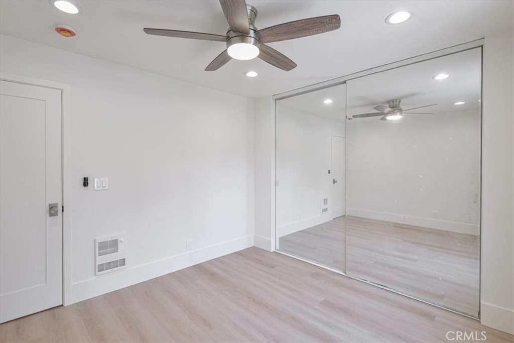 229 Springview Irvine, CA 92620 - Photo 11 of 30 an empty room with fan and entrance