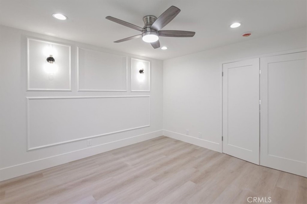 229 Springview Irvine, CA 92620 - Photo 15 of 30 an empty room with cabinet and ceiling fan