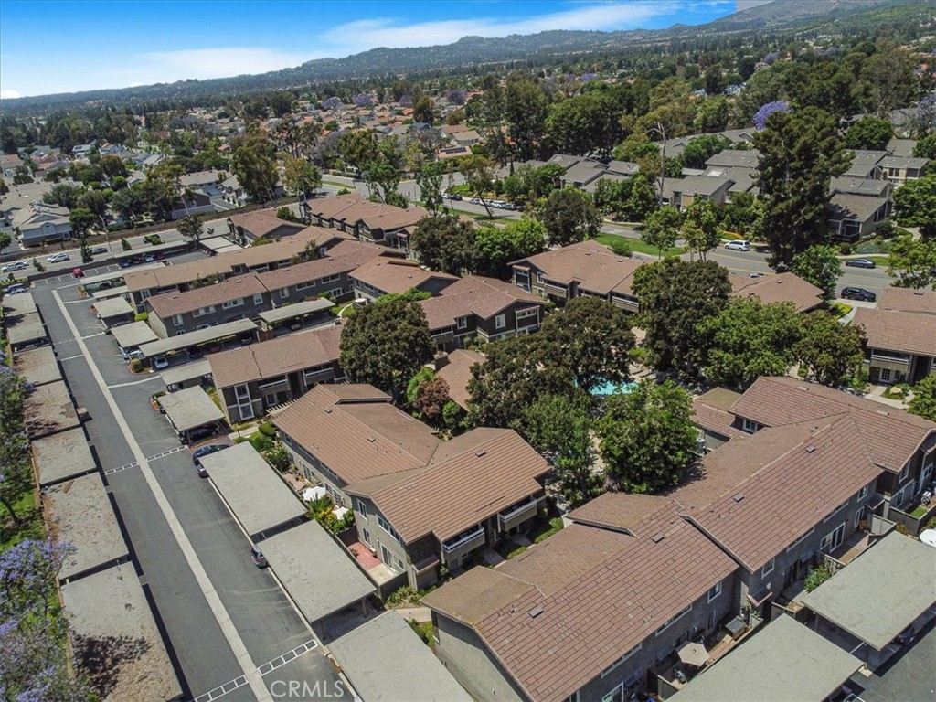 229 Springview Irvine, CA 92620 - Photo 23 of 30 an aerial view of a residential apartment building with a yard