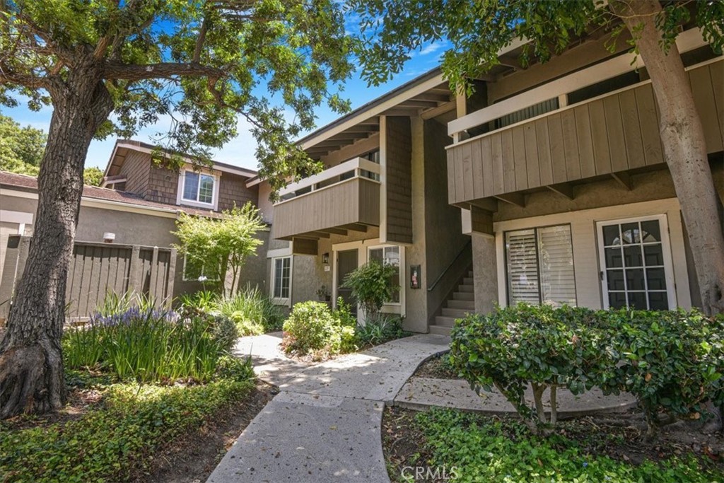 229 Springview Irvine, CA 92620 - Photo 24 of 30 a front view of a house with a yard