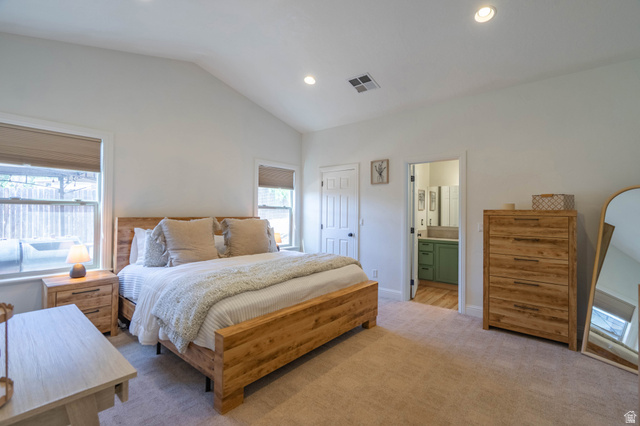 1504 Rome Way Apple Valley, UT 84737 - Photo 10 of 22 Carpeted bedroom featuring vaulted ceilings, recessed lighting, and dual windows with shades