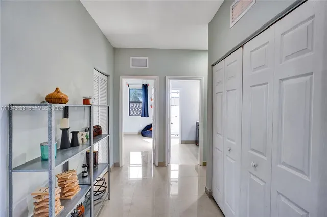 a view of livingroom with furniture and closet