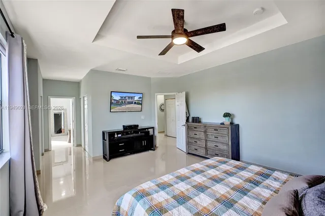 a bedroom with a bed and furniture