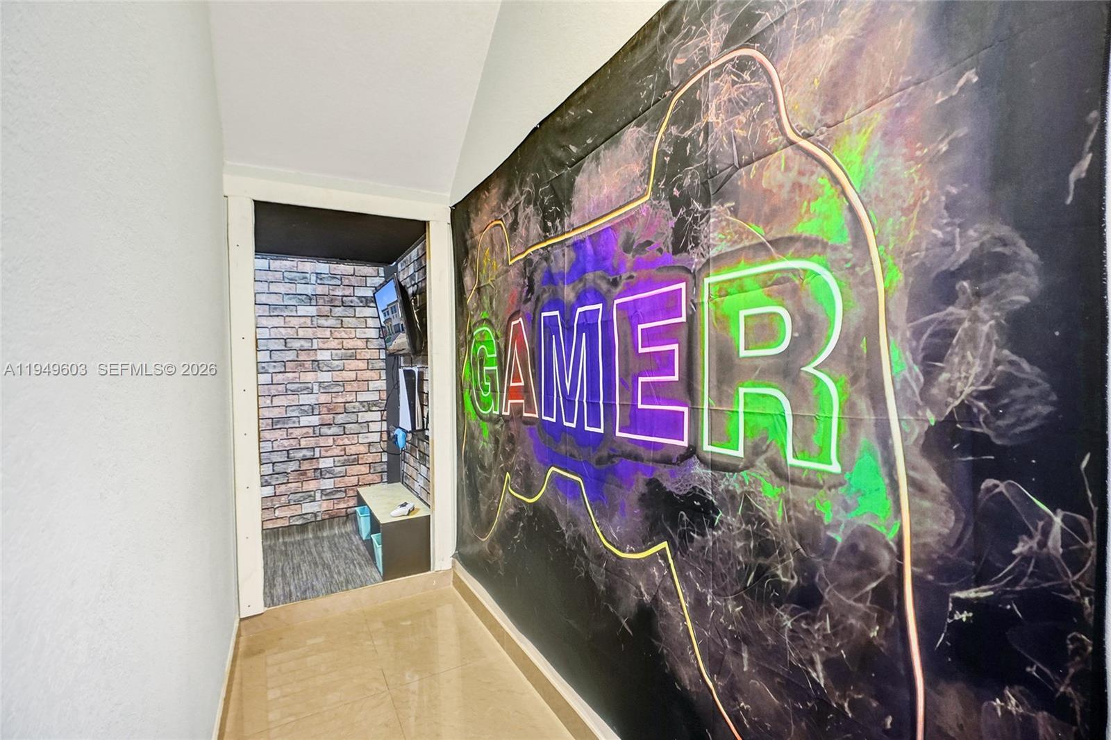 11581 Southwest 151st Place Miami, FL 33196 - Photo 4 of 28 Gaming alcove - hidden under the stairs