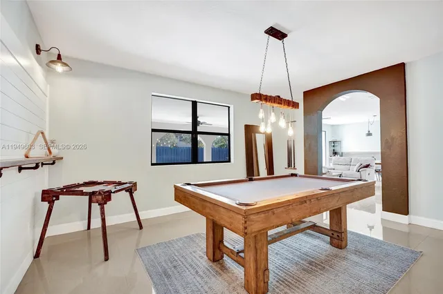 a room with table and chairs