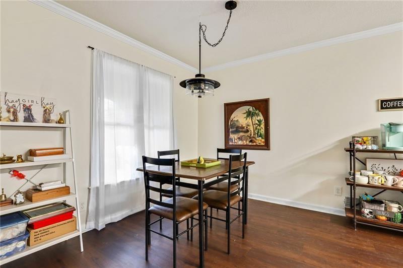 228 Shady Lane Canton, GA 30115 - Photo 8 of 36 a view of a dining room with furniture and wooden floor