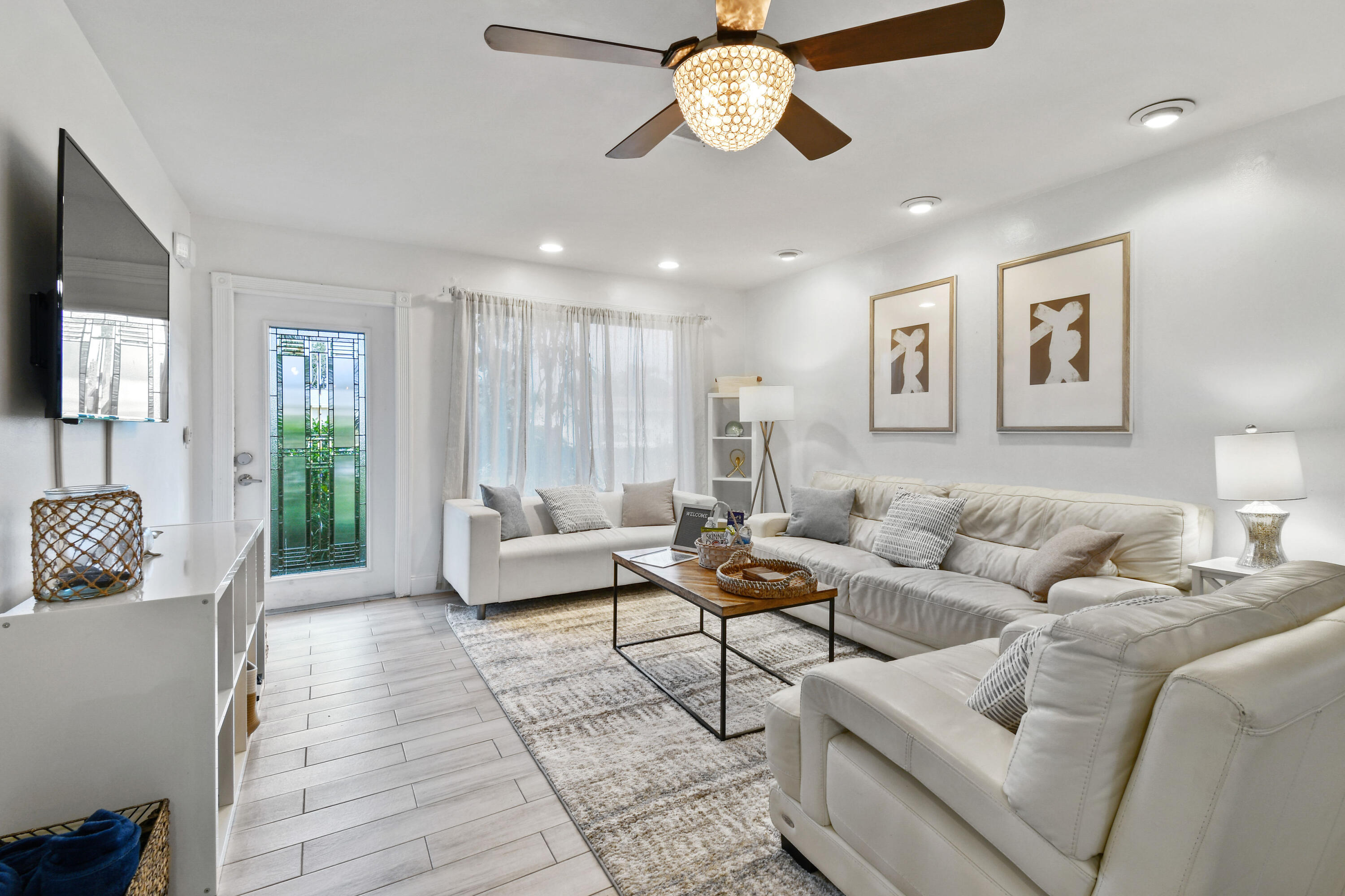 973 Laurel Road North Palm Beach, FL 33408 - Photo 11 of 57 a living room with furniture wooden floor and window