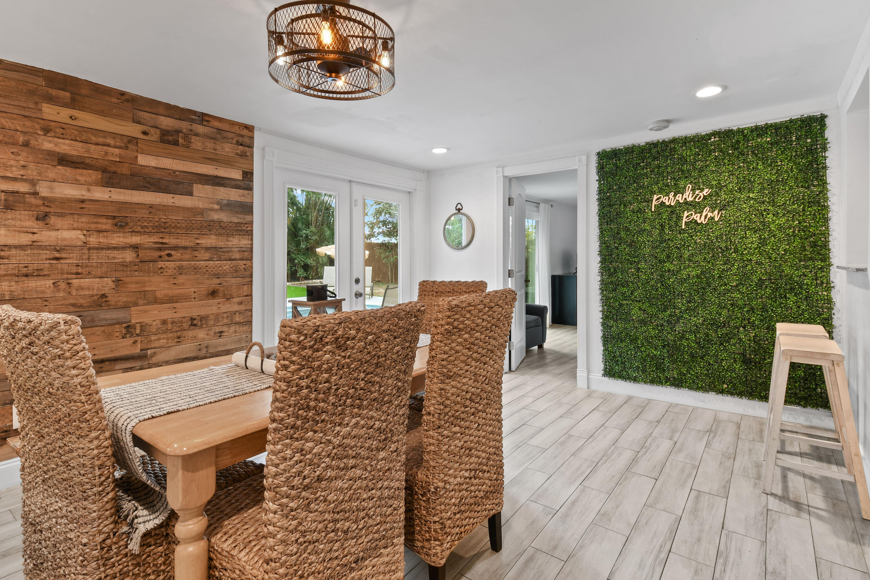 973 Laurel Road North Palm Beach, FL 33408 - Photo 18 of 57 a view of entryway with wooden floor and garden view