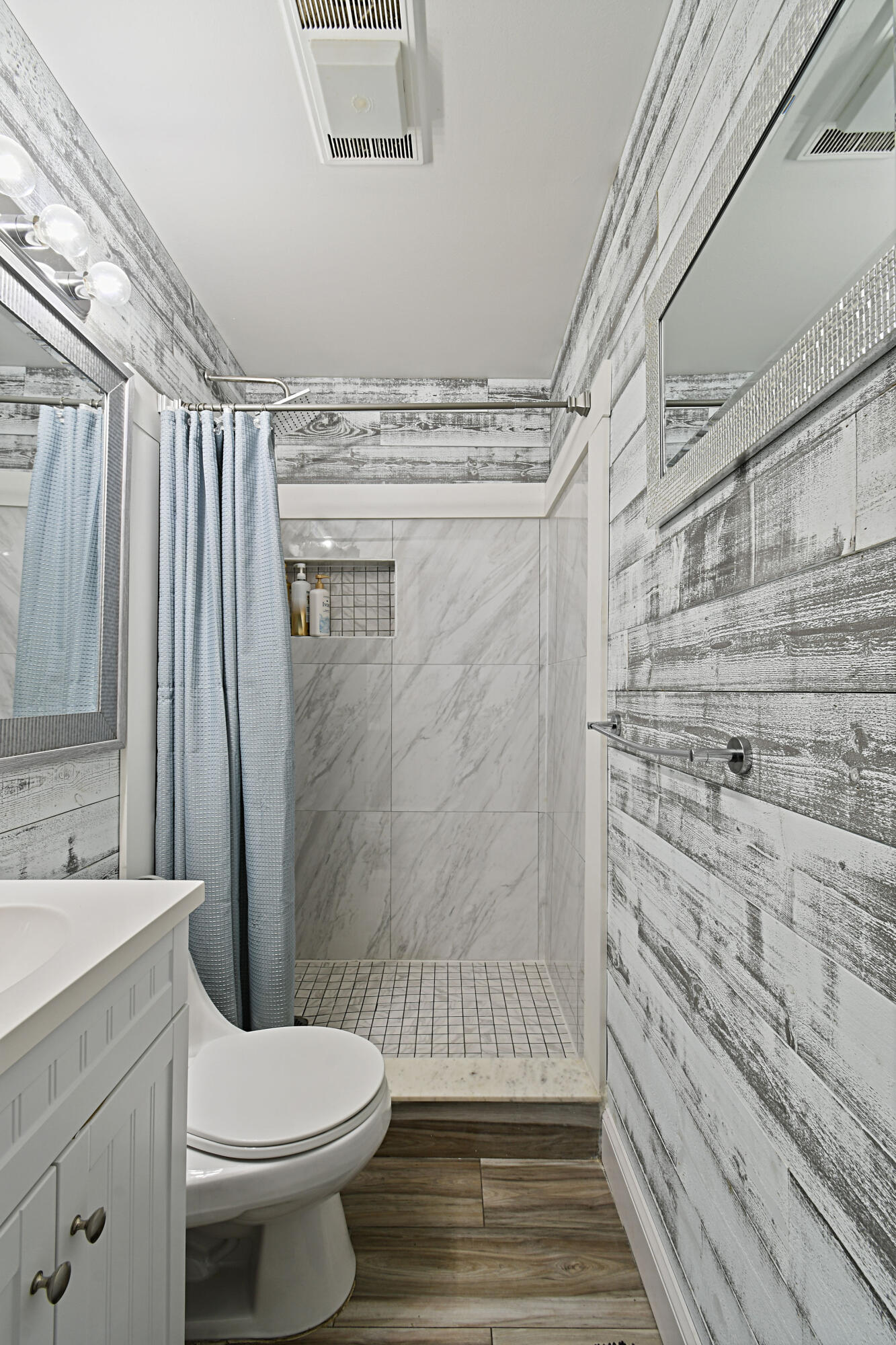 973 Laurel Road North Palm Beach, FL 33408 - Photo 26 of 57 a bathroom with a sink a toilet and shower