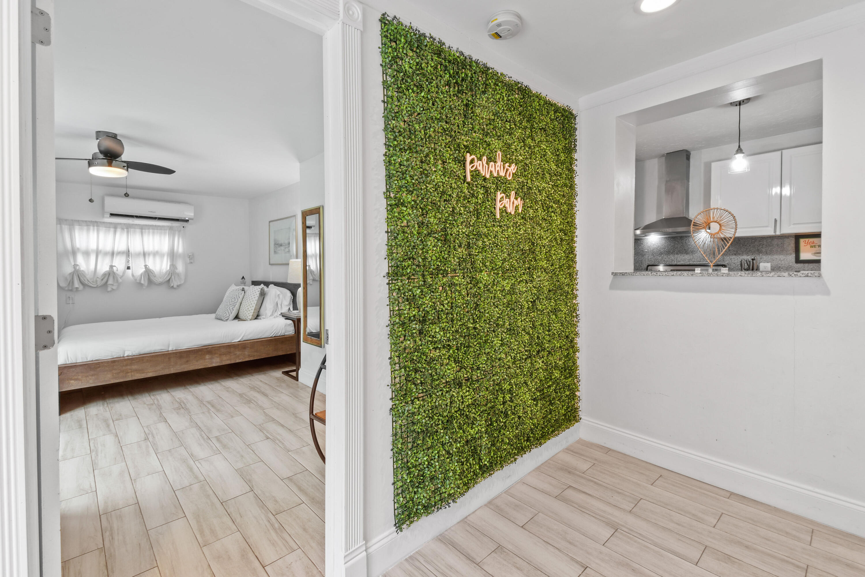 973 Laurel Road North Palm Beach, FL 33408 - Photo 27 of 57 a spacious bedroom with a bed and a window