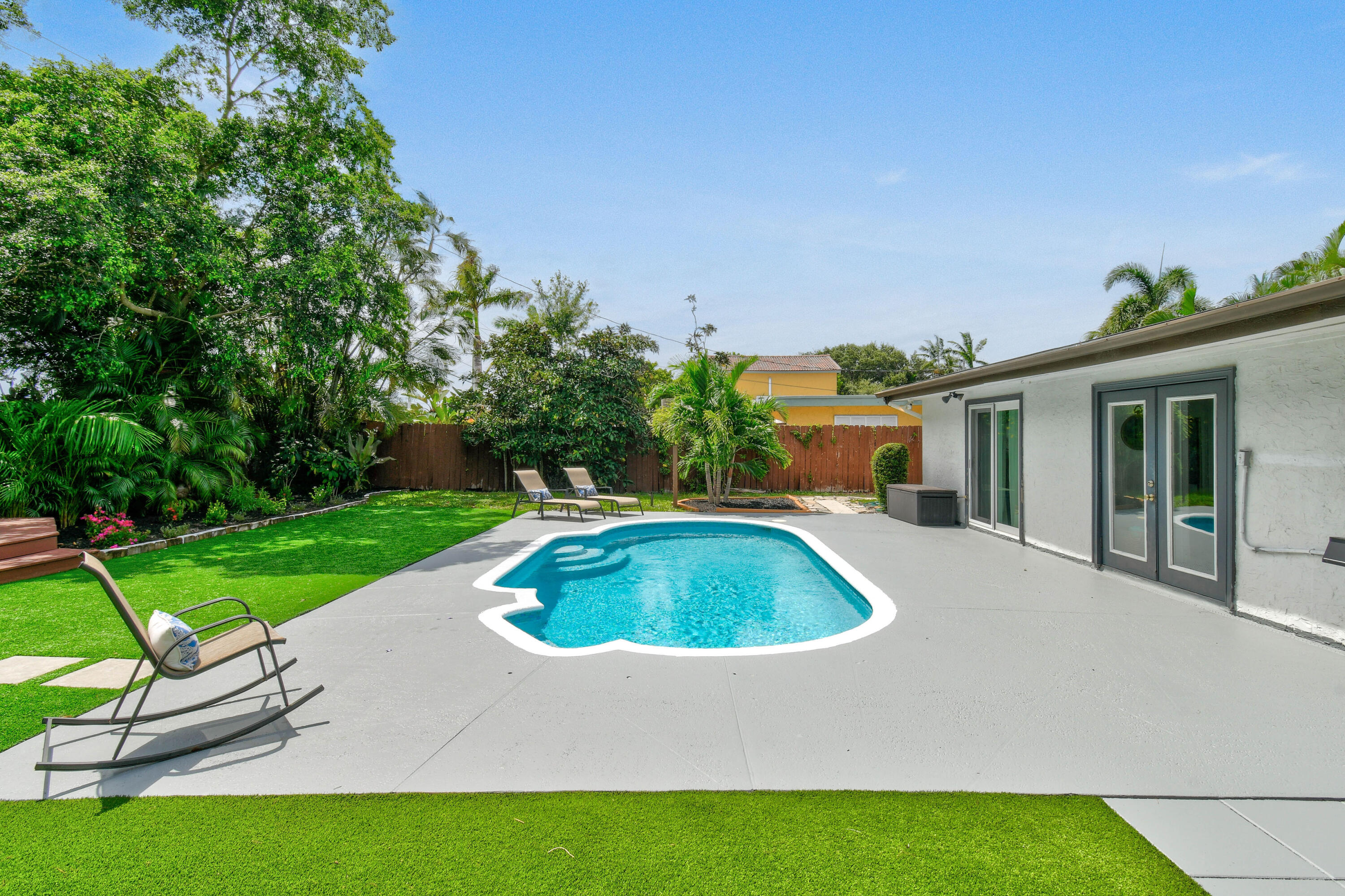 973 Laurel Road North Palm Beach, FL 33408 - Photo 38 of 57 a view of outdoor space yard swimming pool and patio