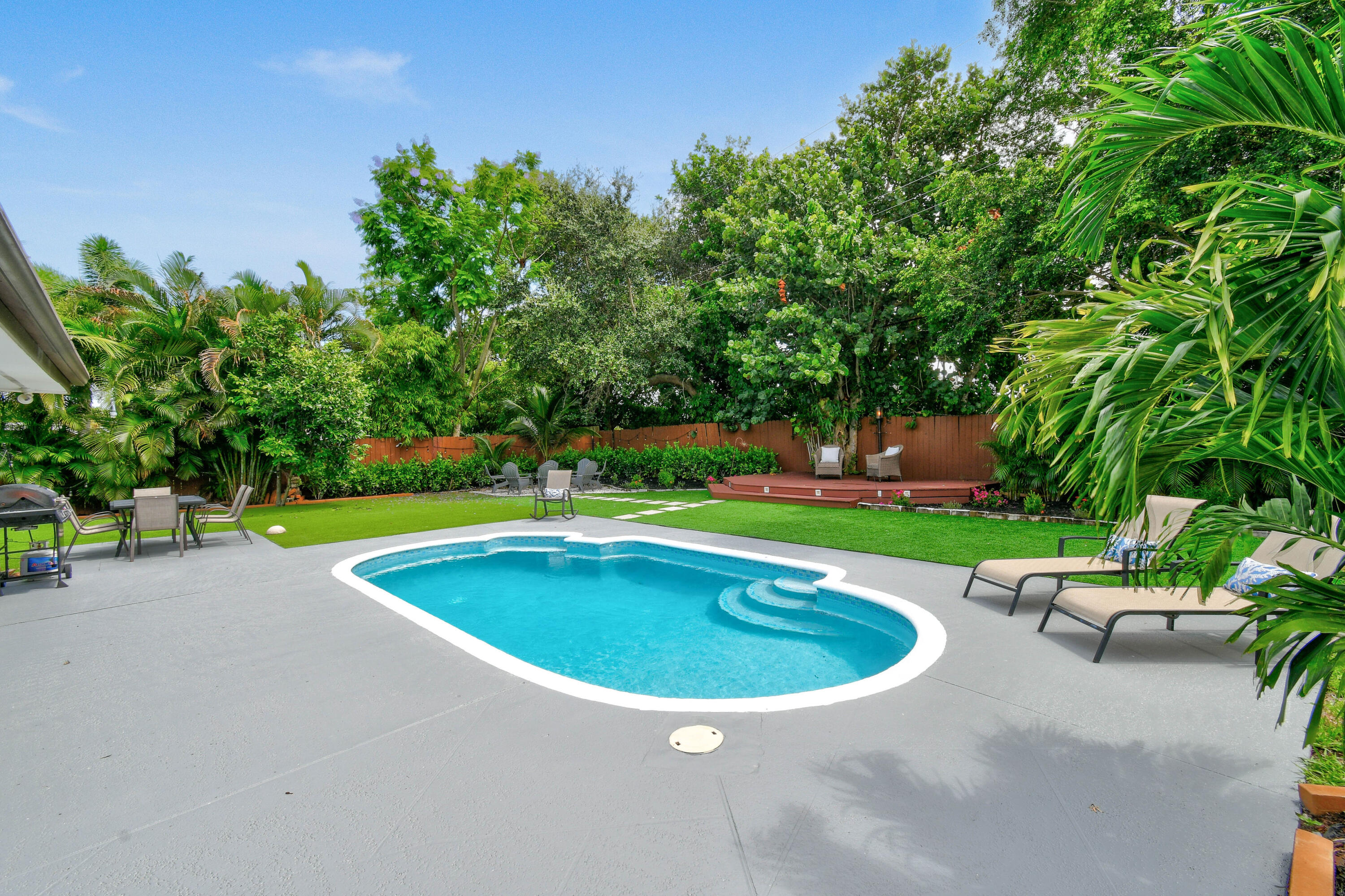 973 Laurel Road North Palm Beach, FL 33408 - Photo 45 of 57 a view of swimming pool with a yard