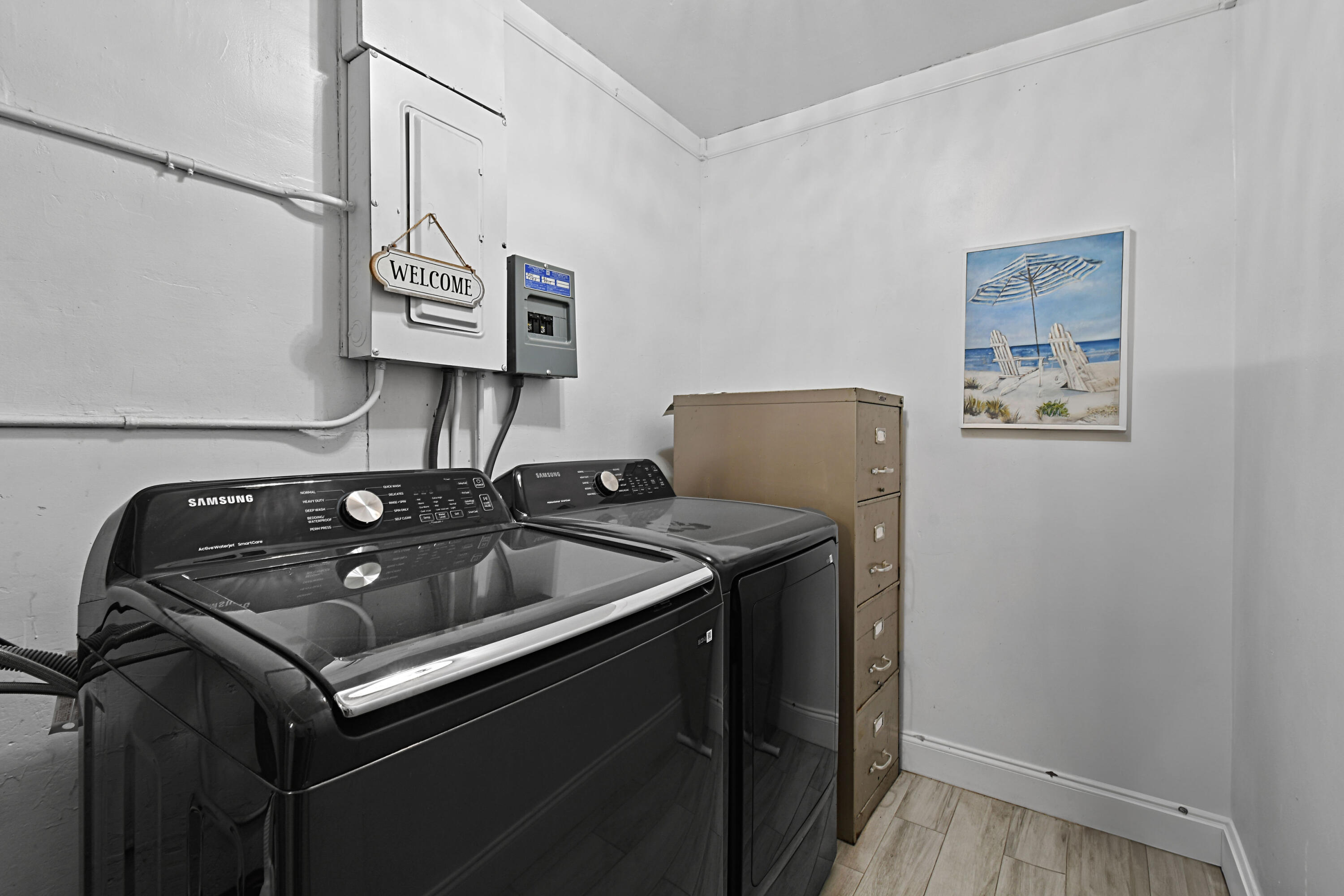 973 Laurel Road North Palm Beach, FL 33408 - Photo 54 of 57 a utility room with dryer and washer