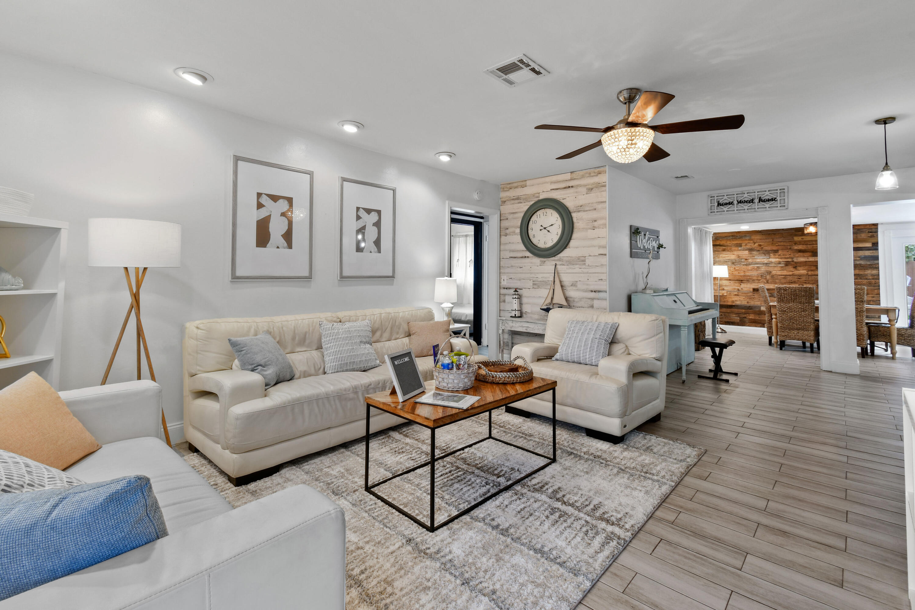 973 Laurel Road North Palm Beach, FL 33408 - Photo 8 of 57 a living room with fireplace furniture and a wooden floor