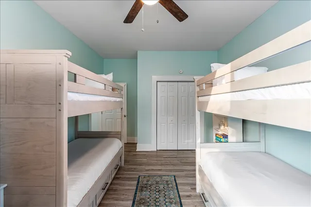 a view of a backyard with chairs