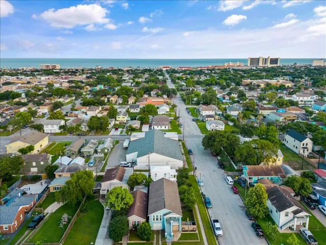 a view of a house with a small yard