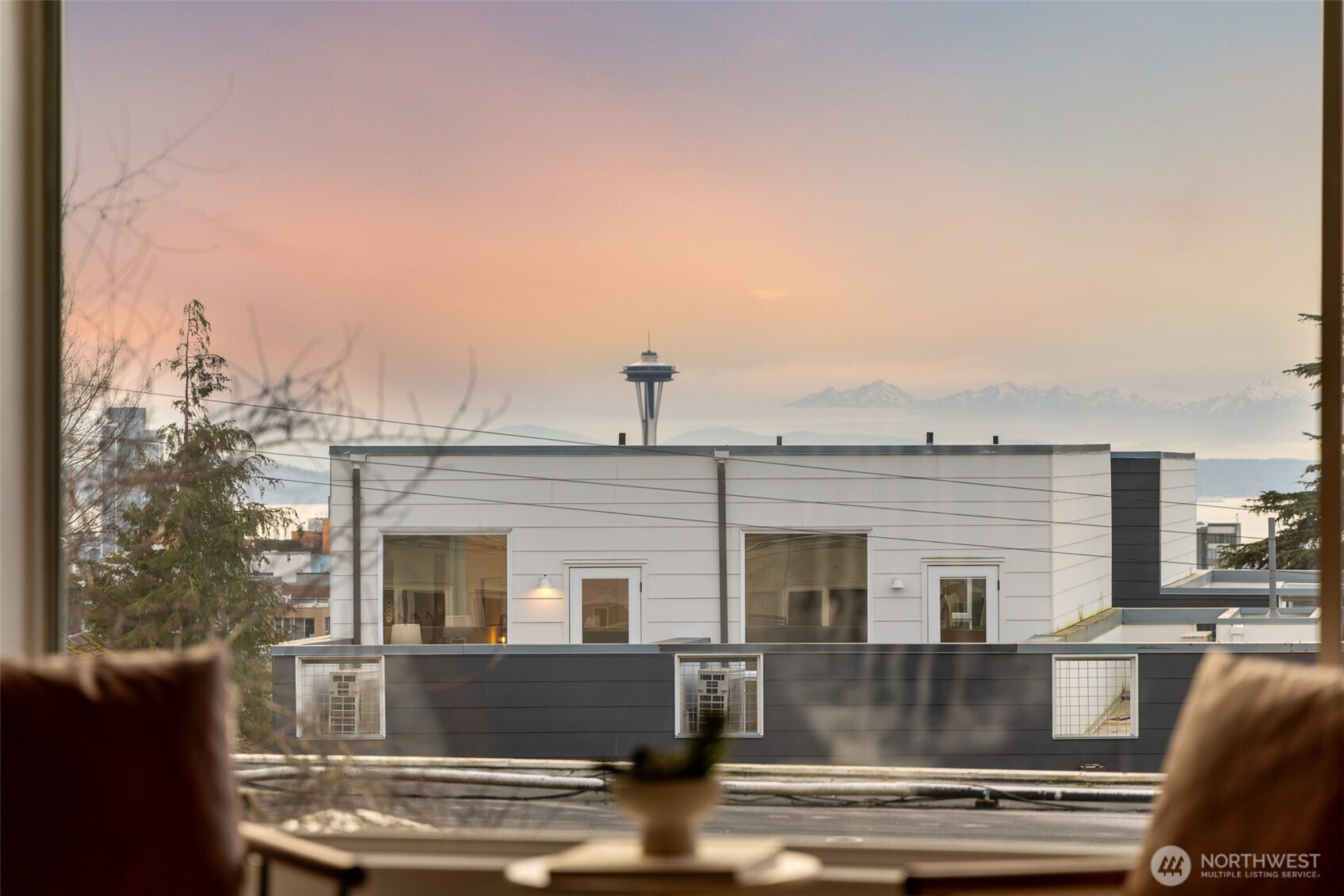 630 13th Avenue East, Unit 3 Seattle, WA 98102 - Photo 22 of 22 a view of a house with couches chairs and kitchen view