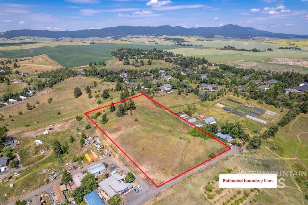 700 Empire Lane Moscow, ID 83843 - Photo 2 of 21 Overview of rural landscape with property parcel outlined and a mountainous background
