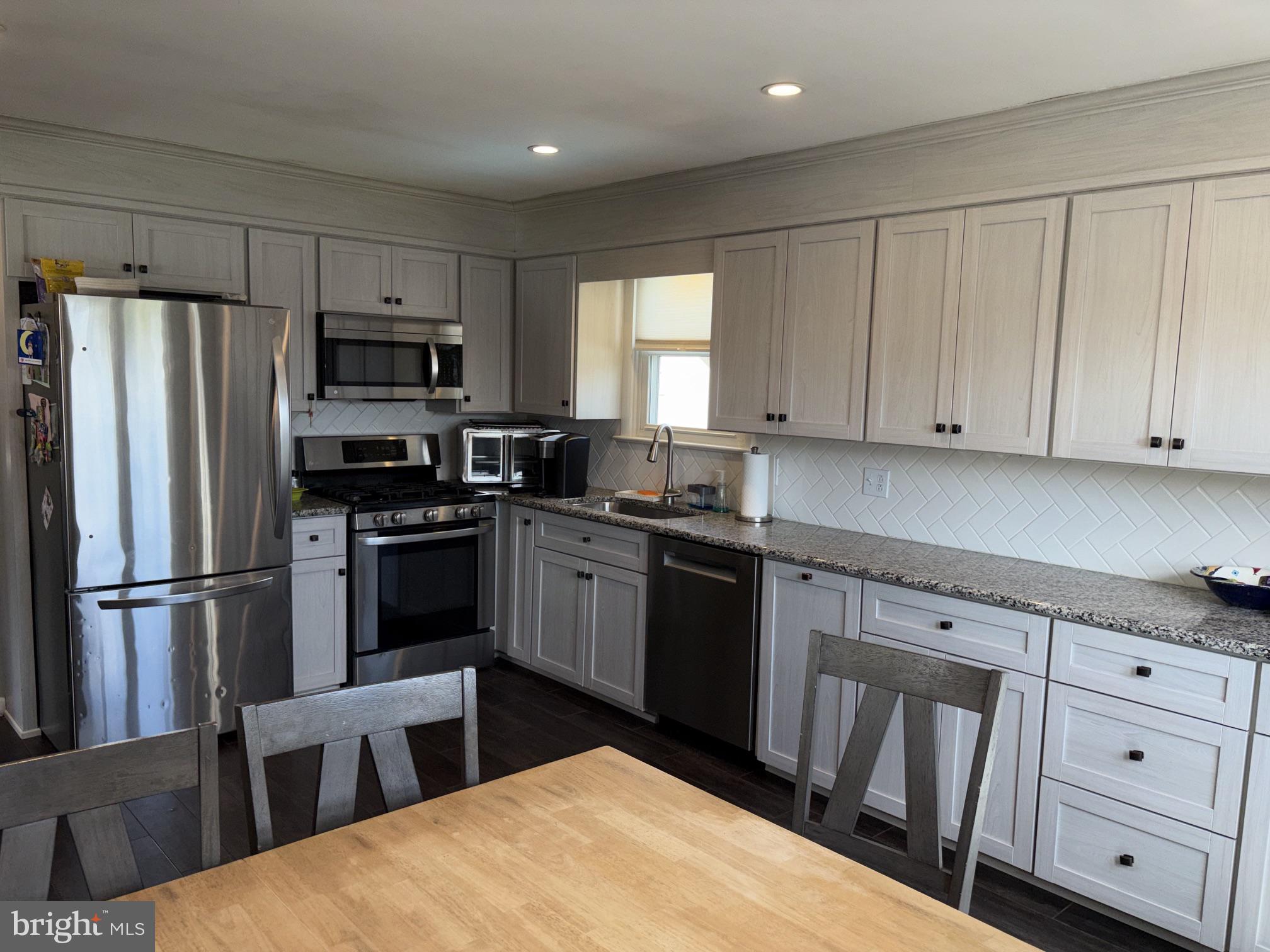 402 Grosstown Road Stowe, PA 19464 - Photo 12 of 37 Modern kitchen with sleek finishes.