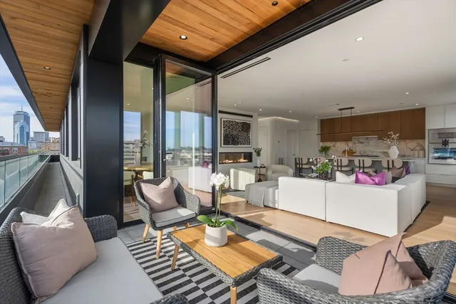 a living room with furniture and a table