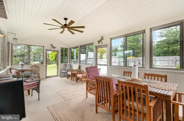 a very nice looking living room with a large window