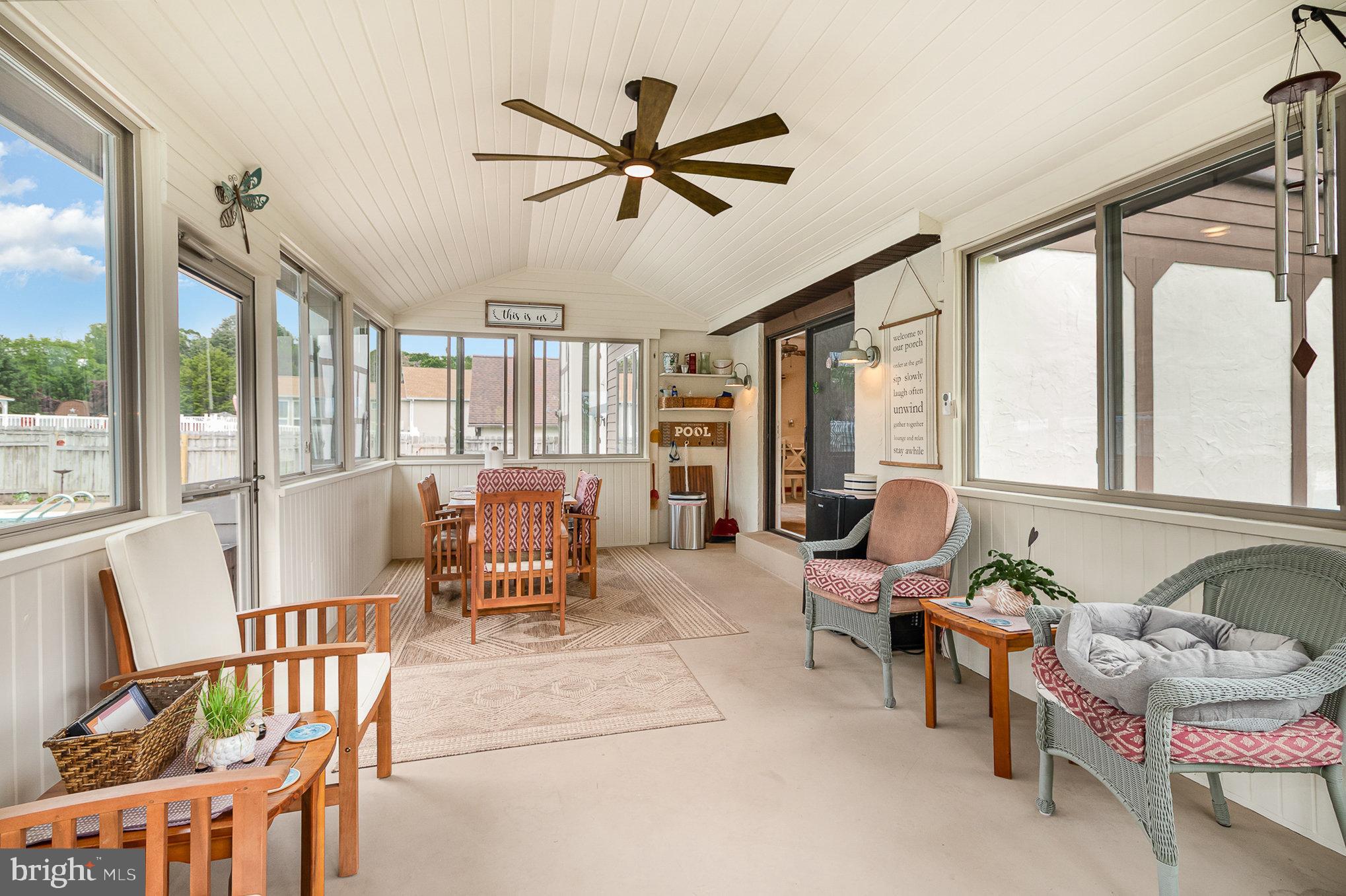 44 Hill Top Road Halifax, PA 17032 - Photo 16 of 40 a living room with furniture and a large window