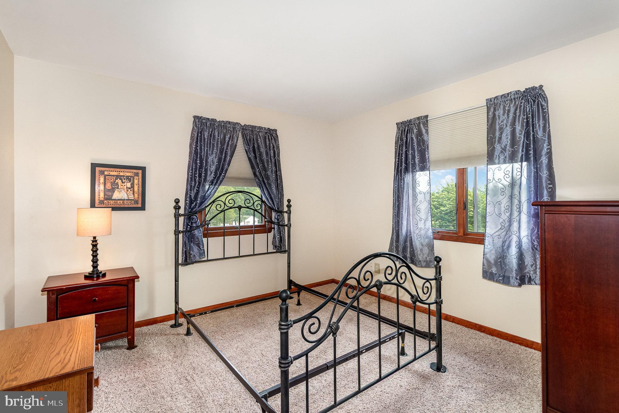 44 Hill Top Road Halifax, PA 17032 - Photo 22 of 40 a living room with furniture a rug and a window