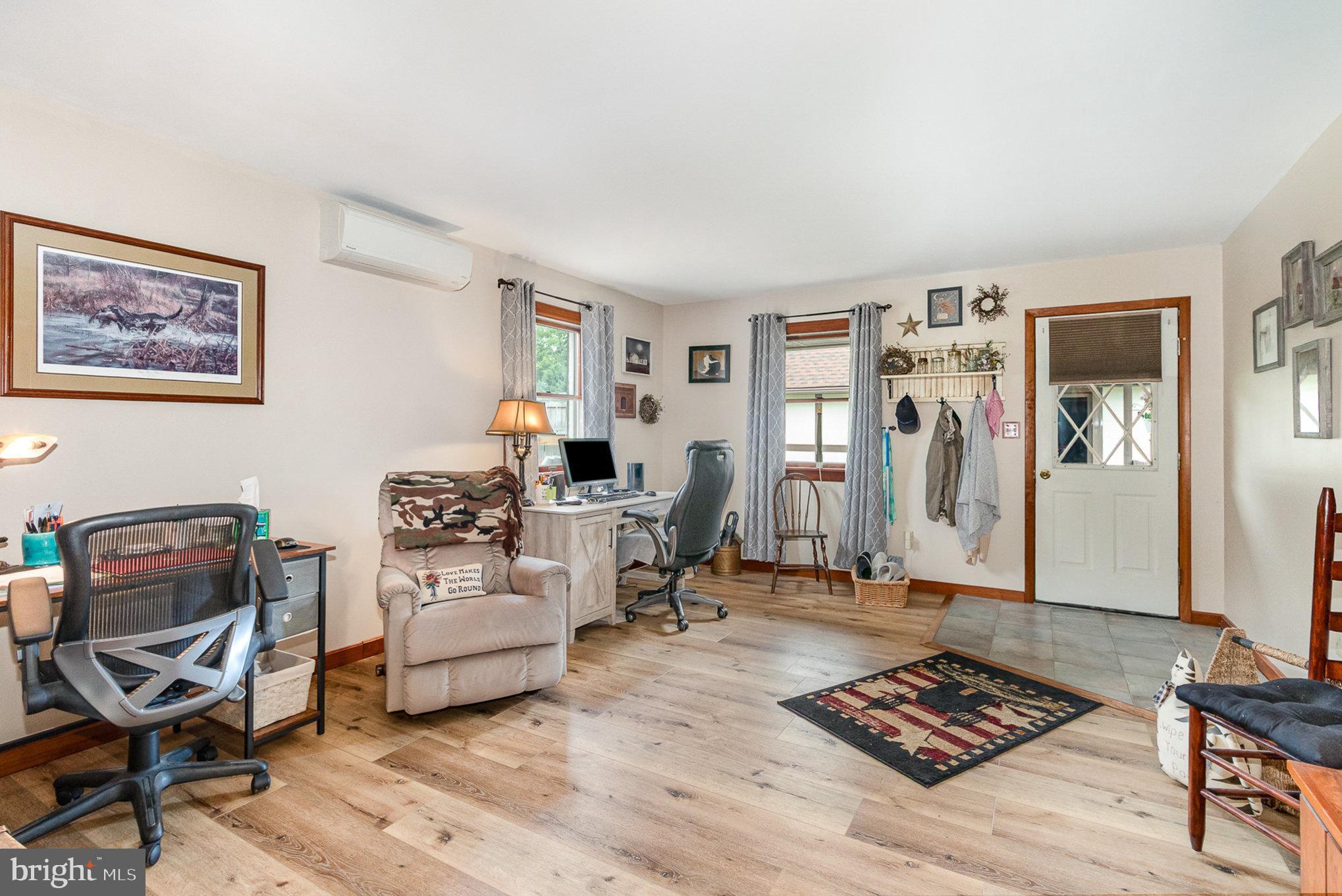 44 Hill Top Road Halifax, PA 17032 - Photo 7 of 40 a living room with furniture a rug and a window
