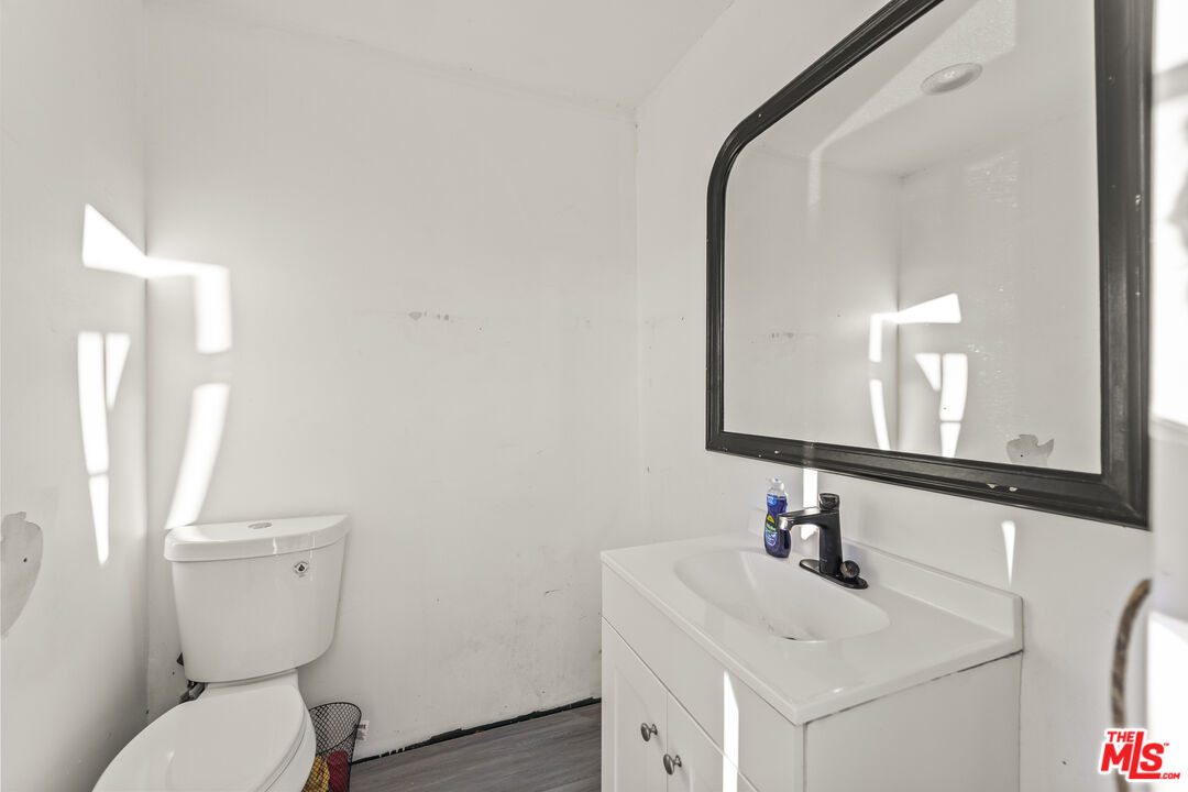 6677 Maricopa Road Phelan, CA 92371 - Photo 31 of 38 a bathroom with a sink and a mirror