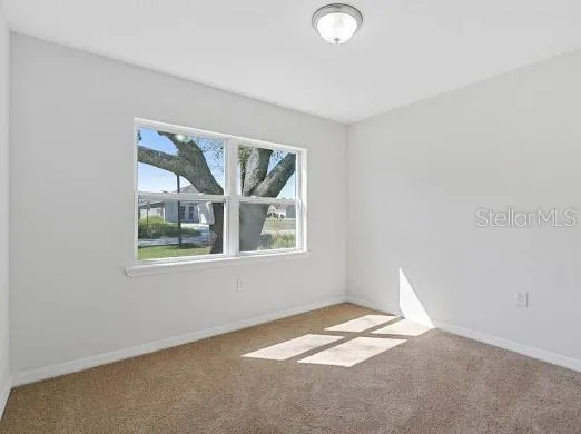 a view of empty room with window