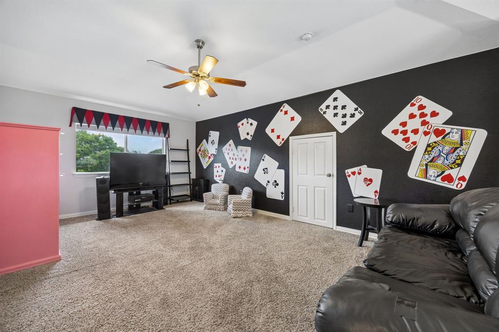 545 Rothschild Lane Murphy, TX 75094 - Photo 20 of 27 Game room with fun designer wall and window treatment.