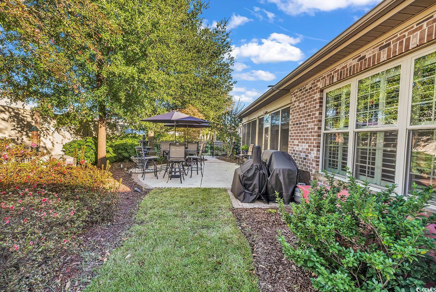 956 Corrado Street Myrtle Beach, SC 29572 - Photo 34 of 38 View of yard with a patio