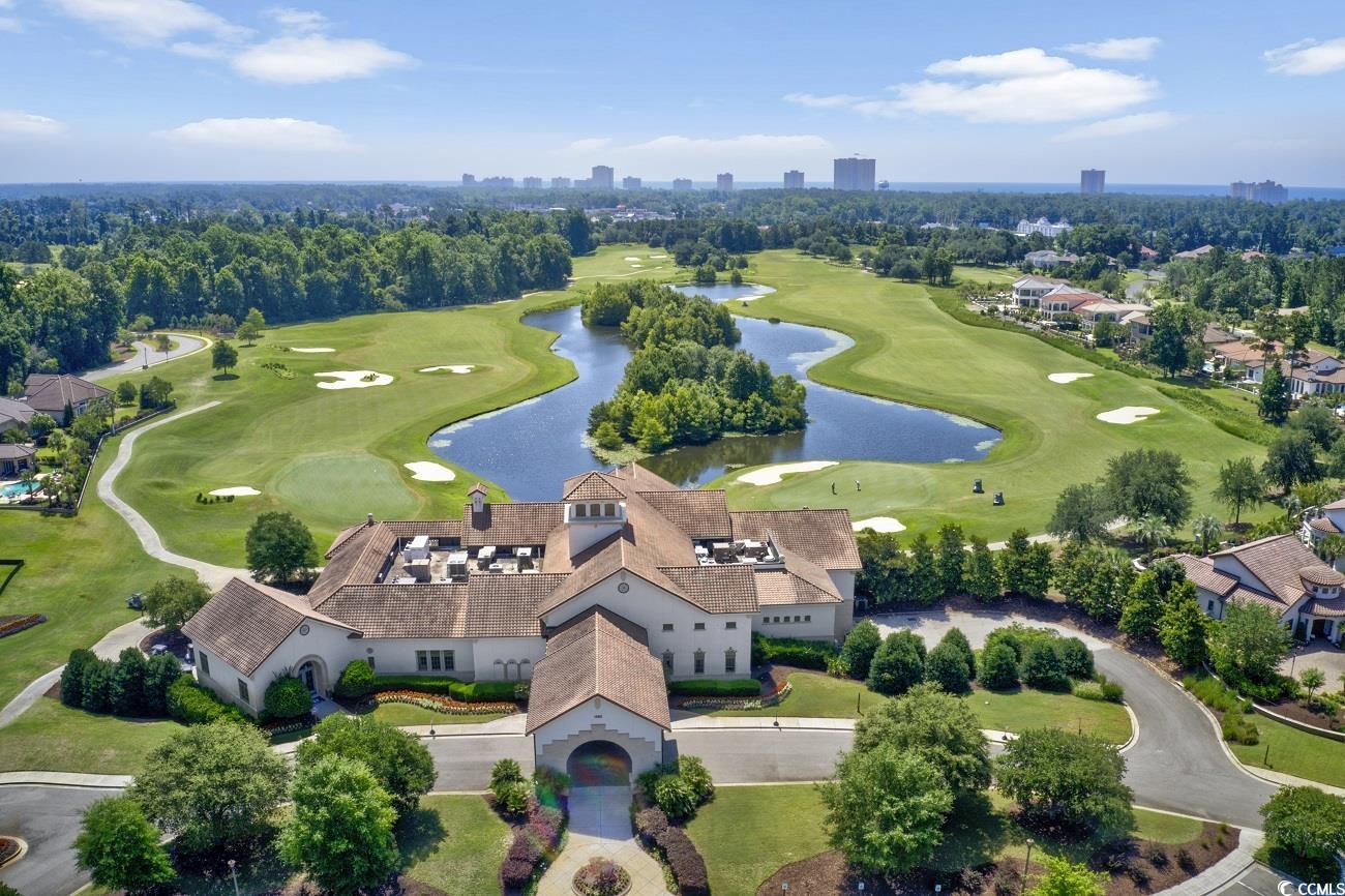 956 Corrado Street Myrtle Beach, SC 29572 - Photo 37 of 38 Drone / aerial view of a golf club and a nearby body of water