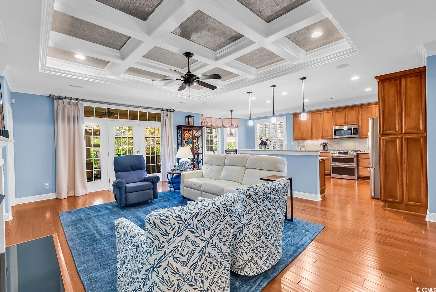 956 Corrado Street Myrtle Beach, SC 29572 - Photo 10 of 38 Living area with ornamental molding, ceiling fan, beamed ceiling, recessed lighting, and light wood finished floors