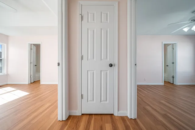 a view of a livingroom with wooden floor