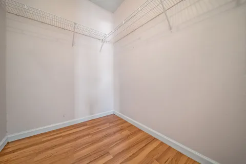 a view of small space with wooden floor