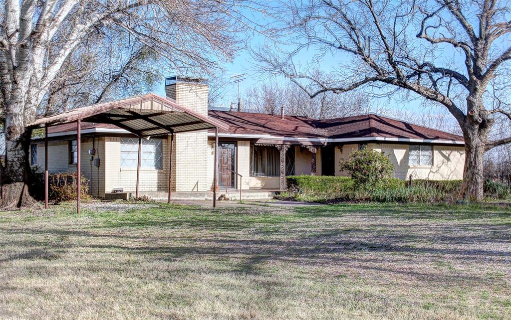 512 North Sherley Road Anna, TX 75409 - Photo 2 of 20 a front view of a house with a garden