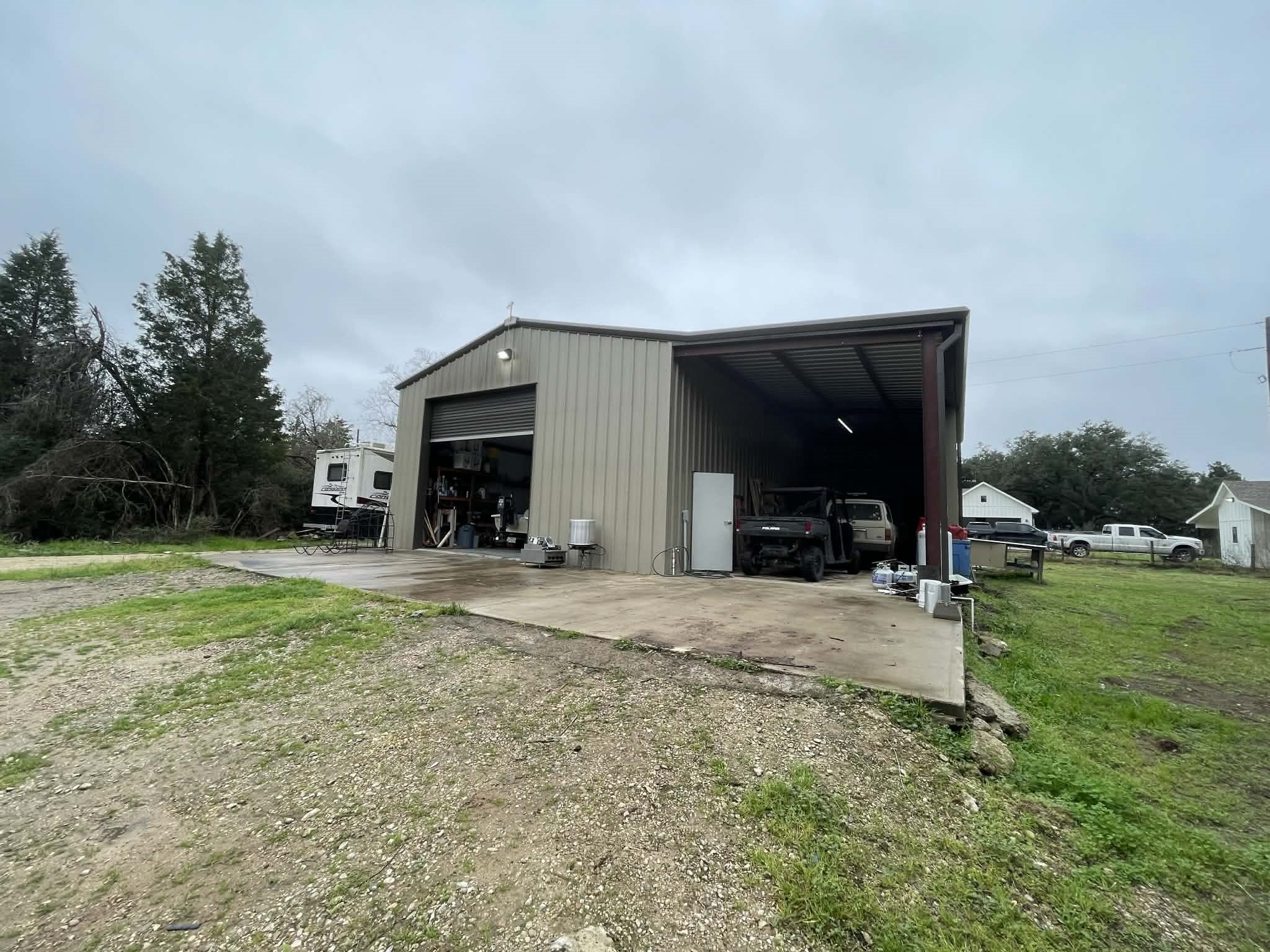 4046 Kurtz Road Sealy, TX 77474 - Photo 15 of 27 40X60 Shop with overhang and RV hook ups