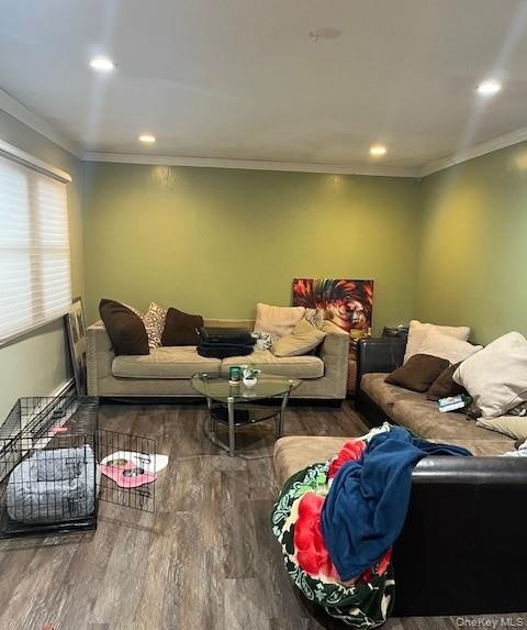 226 14th Avenue West Babylon, NY 11704 - Photo 11 of 27 a living room with furniture and a wooden floor