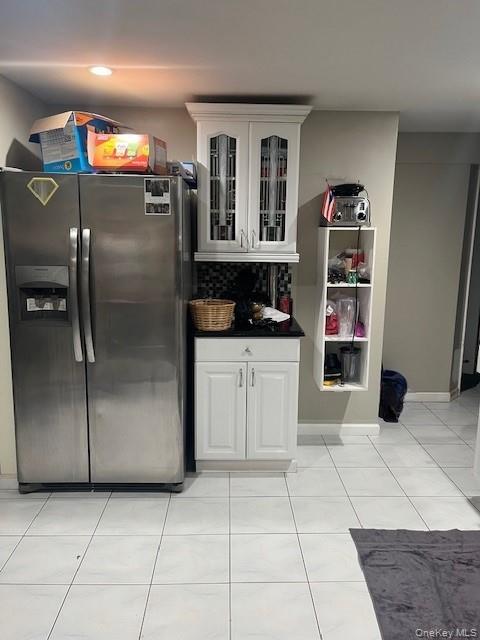 226 14th Avenue West Babylon, NY 11704 - Photo 14 of 27 a kitchen with stainless steel appliances granite countertop a refrigerator and a sink