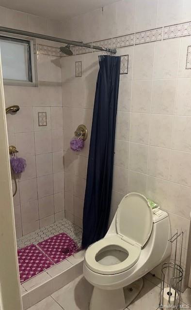 226 14th Avenue West Babylon, NY 11704 - Photo 23 of 27 a bathroom with a sink toilet and shower