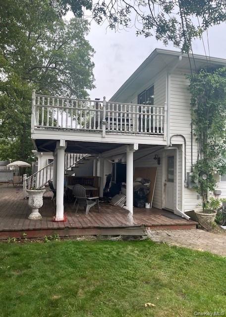 226 14th Avenue West Babylon, NY 11704 - Photo 26 of 27 a view of a house with backyard porch and sitting area