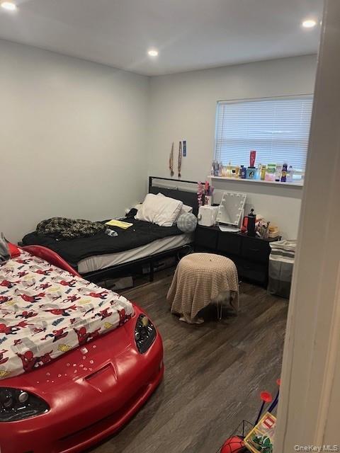 226 14th Avenue West Babylon, NY 11704 - Photo 8 of 27 a bedroom with bed and a night stand