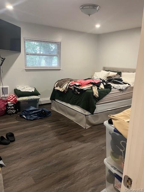 226 14th Avenue West Babylon, NY 11704 - Photo 9 of 27 a bedroom with bed and a tv