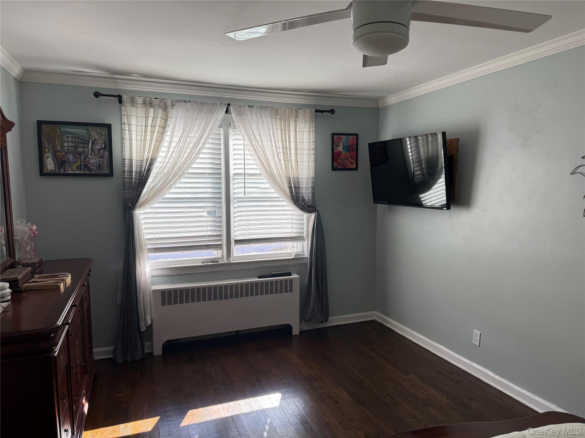 37 D Carpenter Avenue, Unit 37D Mount Kisco, NY 10549 - Photo 7 of 14 a view of an empty room with wooden floor and windows