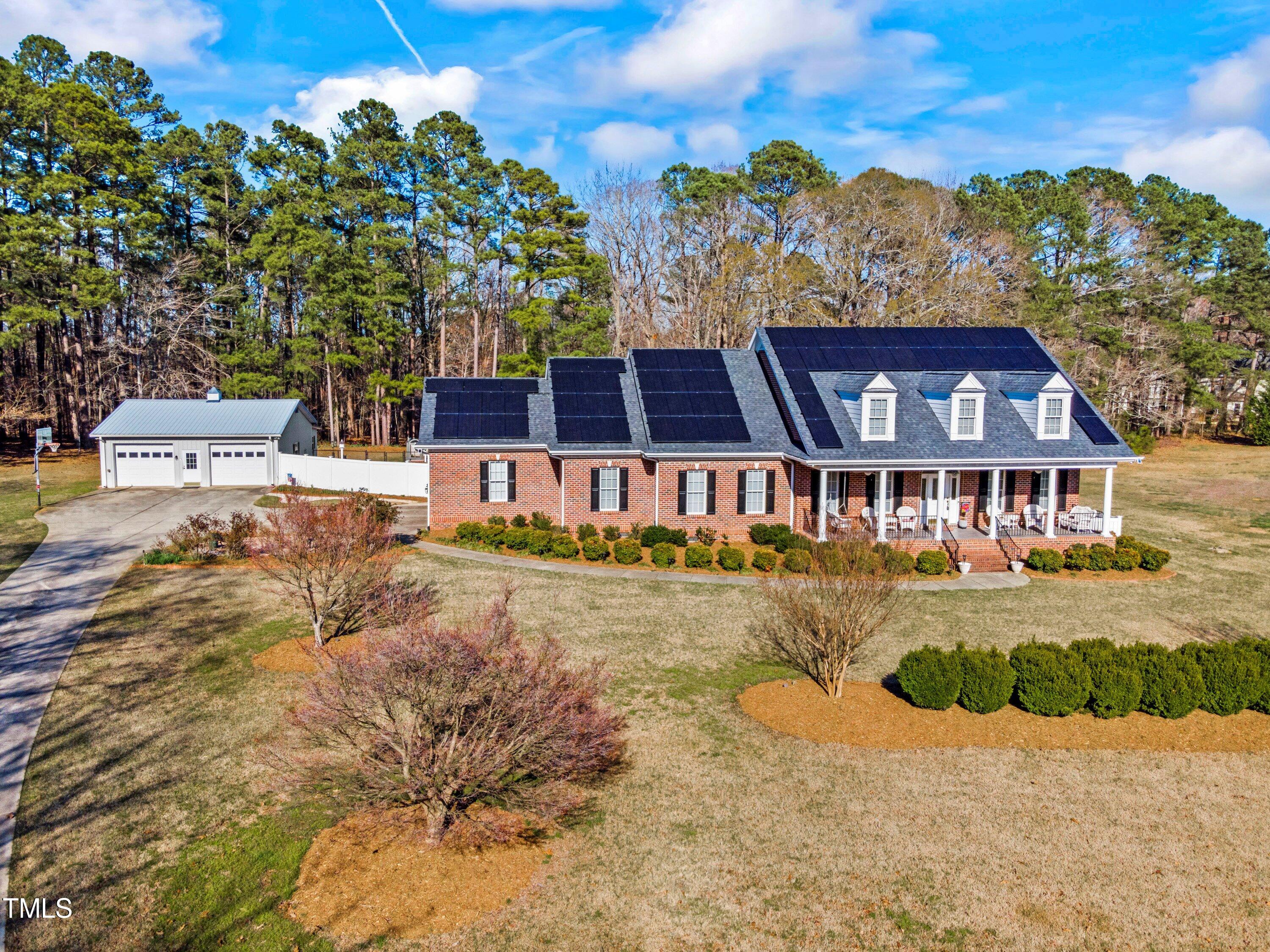 a view of a house with a big yard