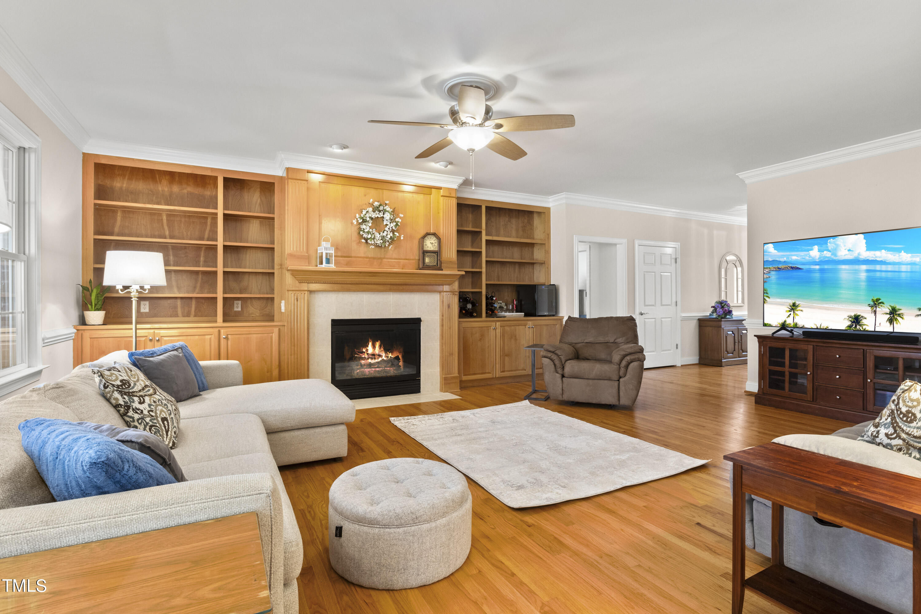 5504 Yates Mill Pond Road Raleigh, NC 27606 - Photo 11 of 56 a living room with furniture and a fireplace
