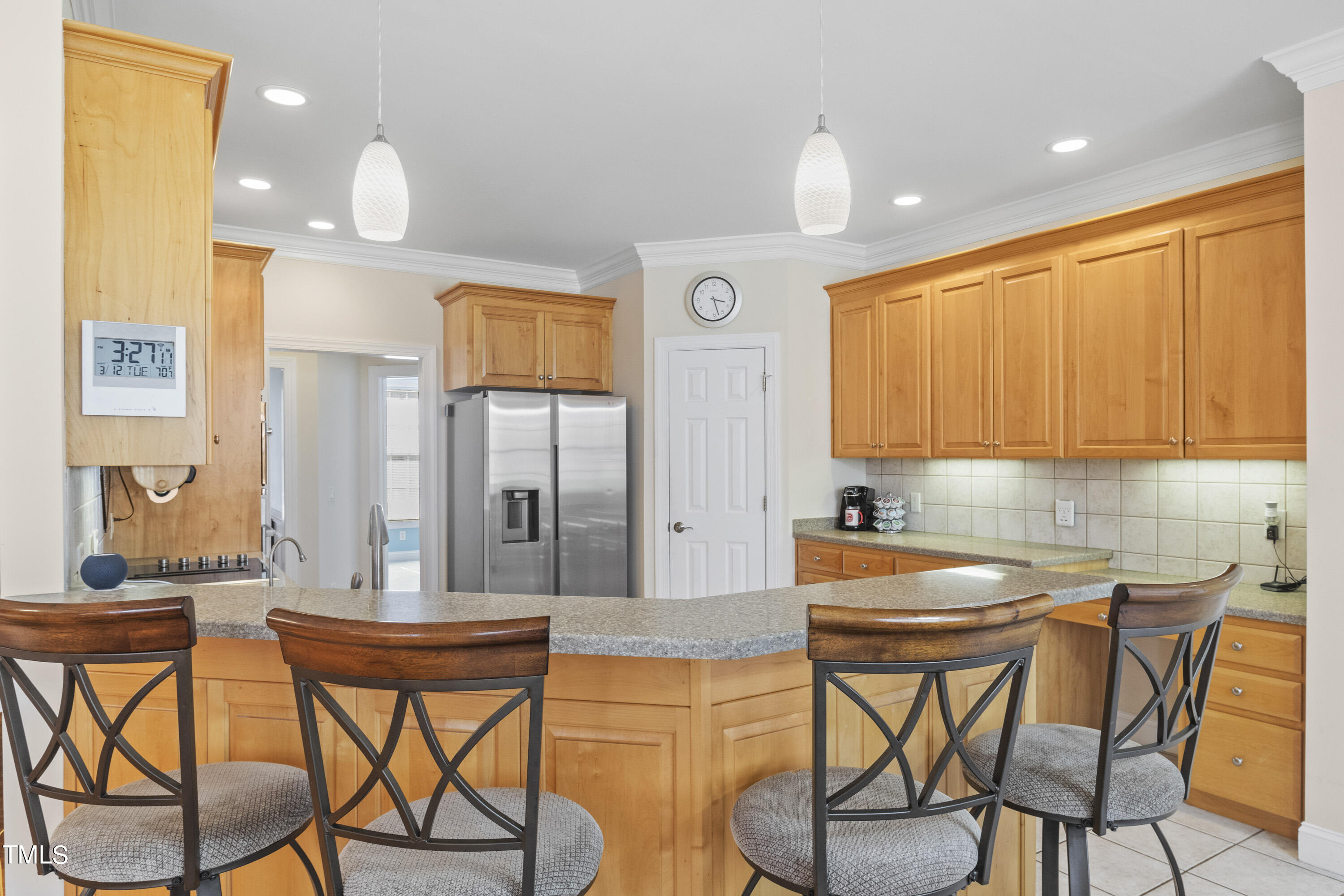 5504 Yates Mill Pond Road Raleigh, NC 27606 - Photo 14 of 56 a dining room filled chandelier and wooden furniture