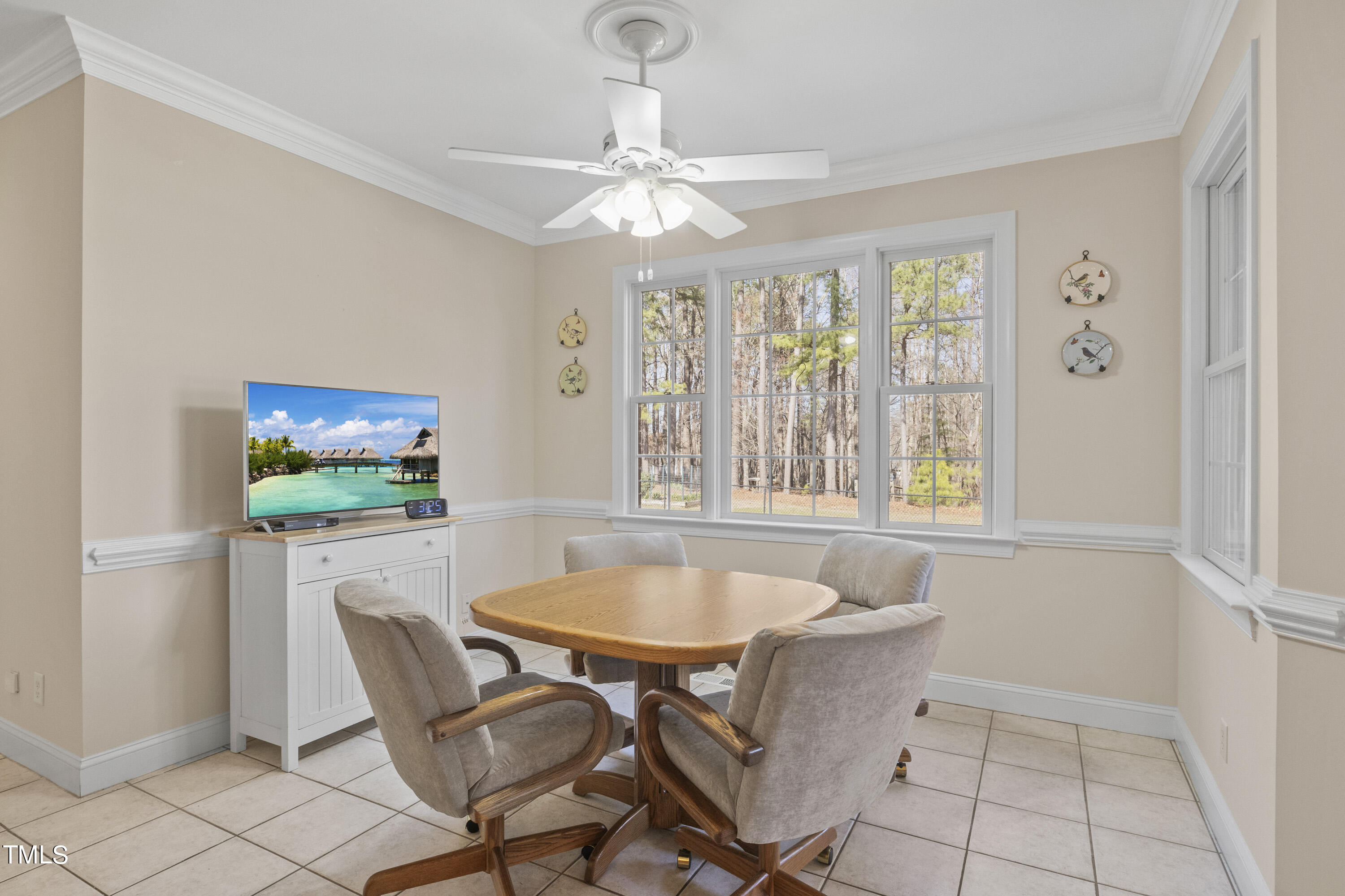 5504 Yates Mill Pond Road Raleigh, NC 27606 - Photo 16 of 56 a dining room with furniture and window
