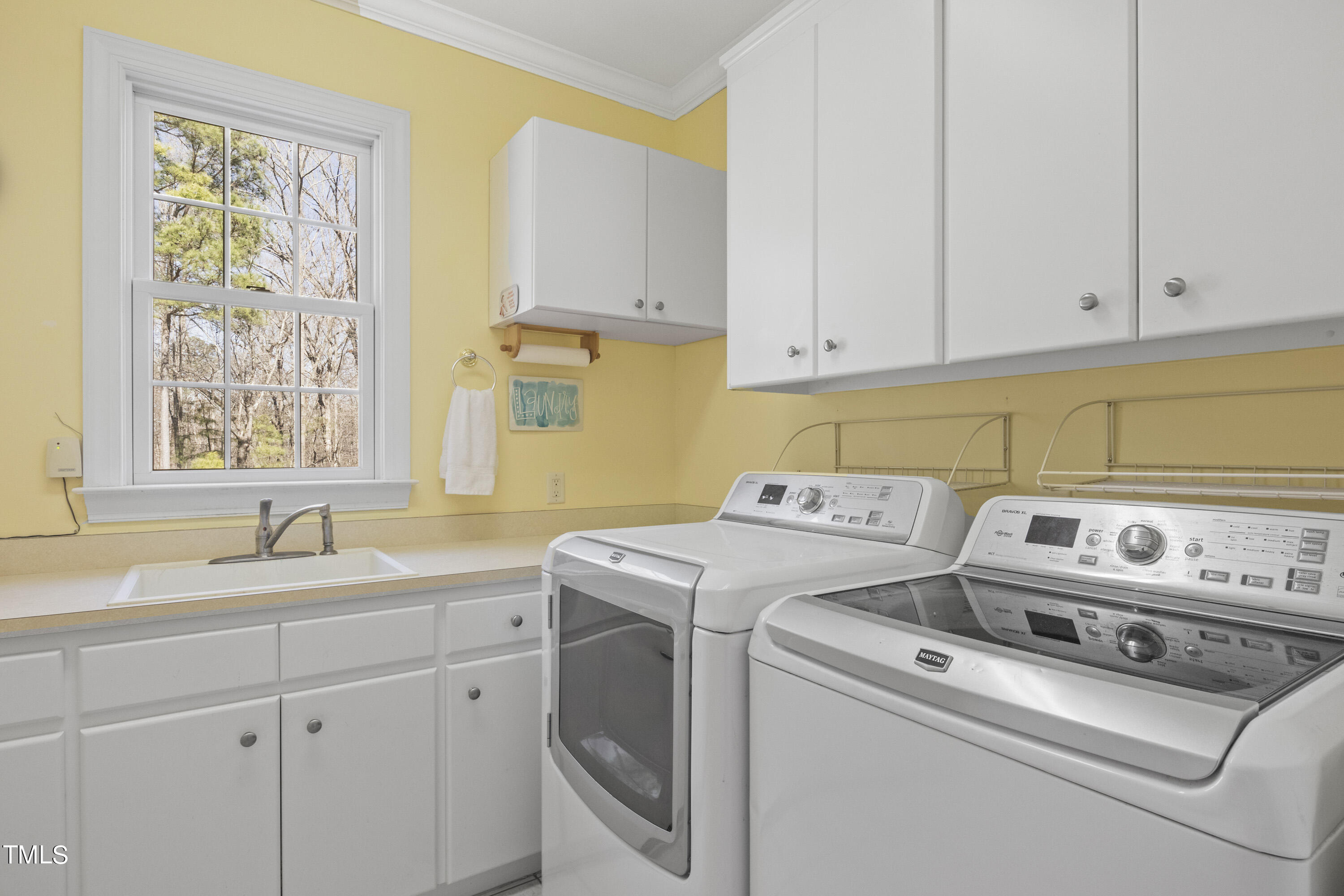 5504 Yates Mill Pond Road Raleigh, NC 27606 - Photo 17 of 56 a utility room with dryer and washer
